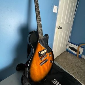 NEW BROWN ELECTRIC GUITAR